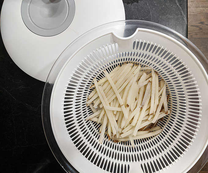 easy homemade french fries in salad spinner